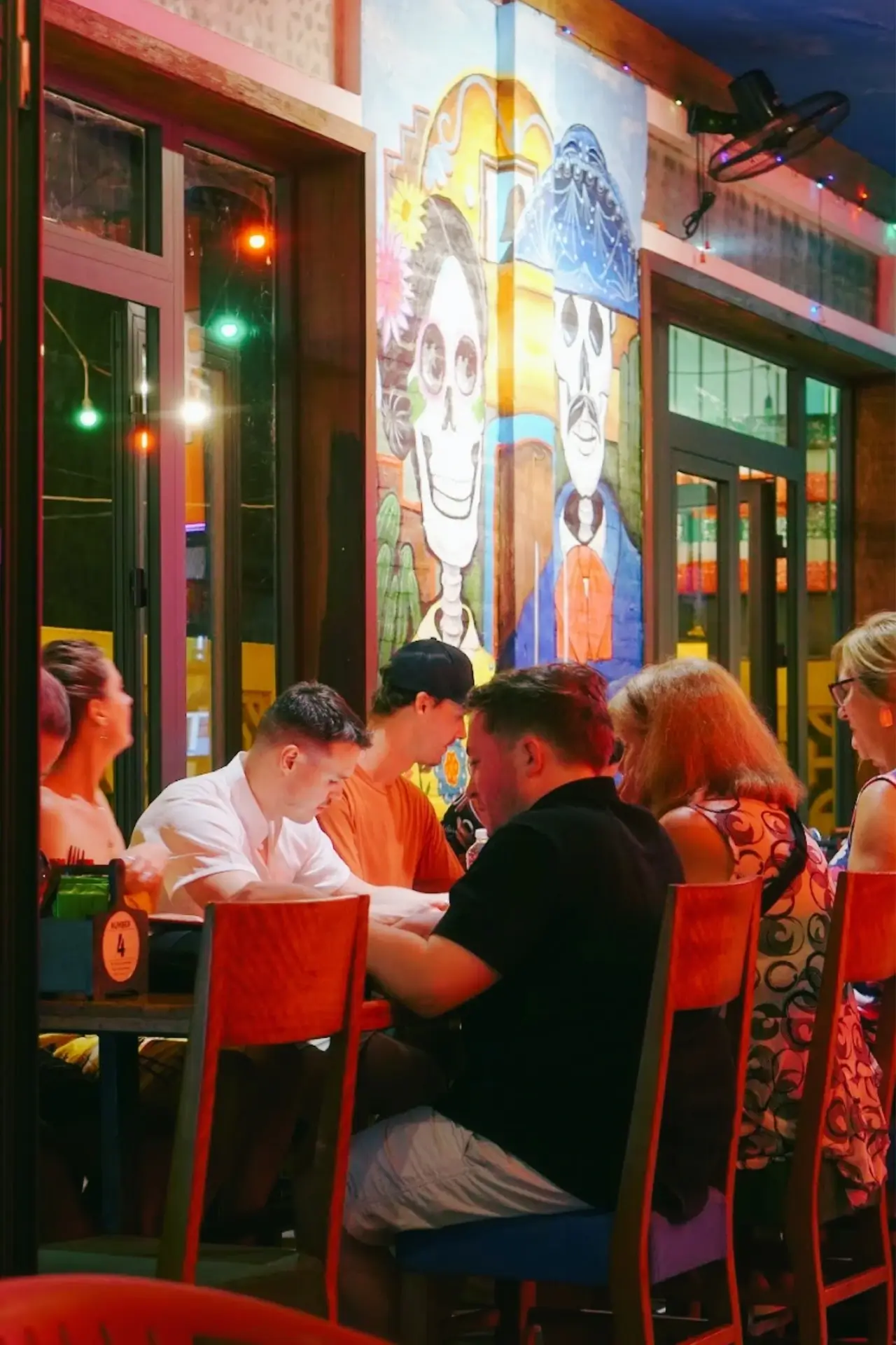 Friends enjoying drinks at the relaxed Casa Loco An Bang.