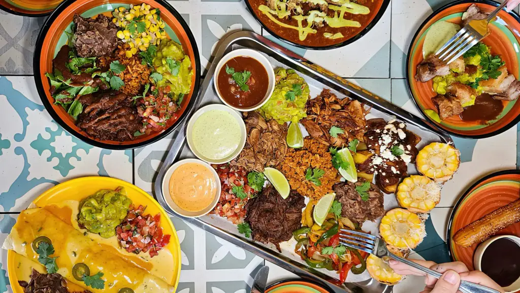 A vibrant table of popular Mexican food dishes at Casa Loco in Vietnam.